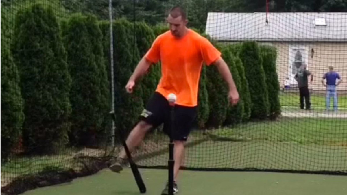 Incredible baseball bat trick swing Sports Illustrated