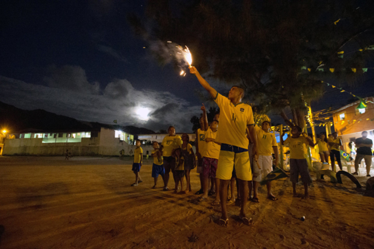 Brazilian fireworks are no joke. The ones that lit up the night sky sounded like gunshots. The ones that detonated in the nearby dirt park sounded like bombs. 