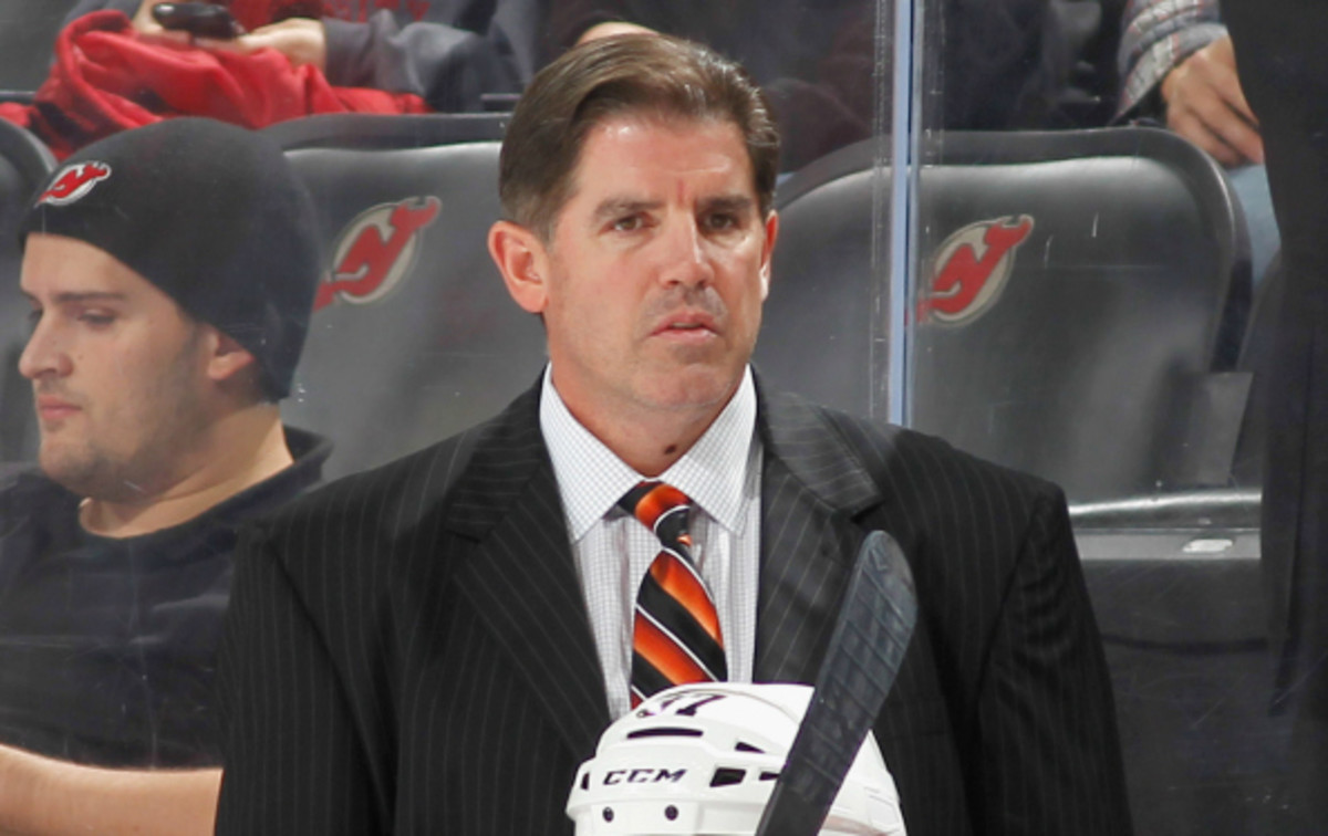 Peter Laviolette was fired by the Flyers three games into the season. (Andy Marlin/Getty Images)