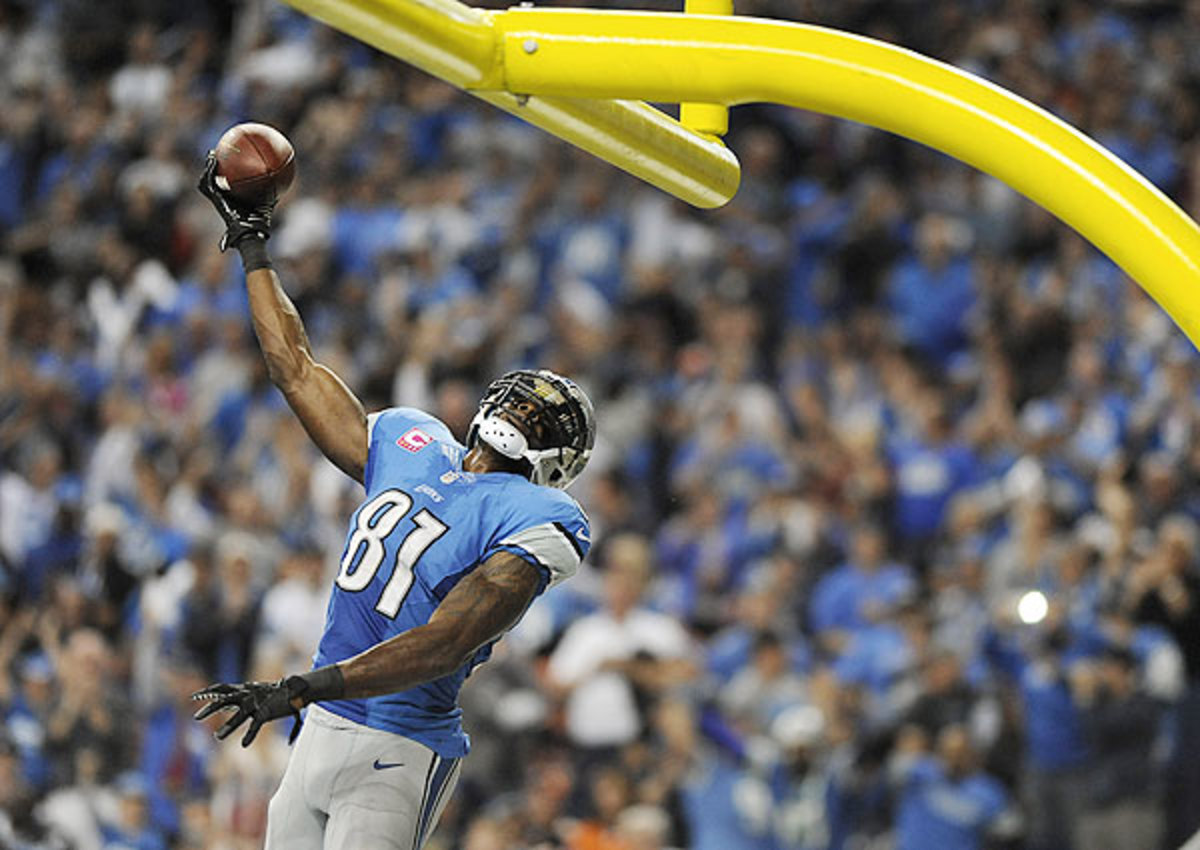 Calvin Johnson plans to continue dunking on goalposts despite new NFL rule