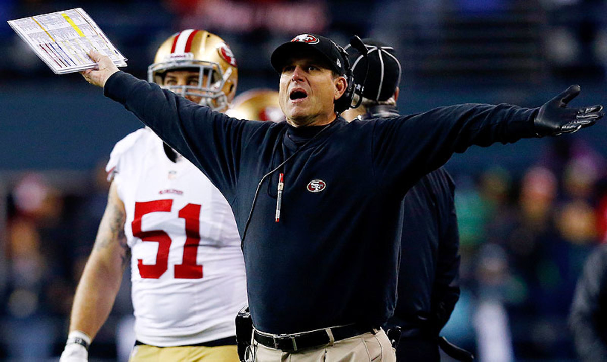 Jim Harbaugh has taken the 49ers to the playoffs every season he's been the coach, but he's still working under the original contract he accepted when he left Stanford in 2011. (Tom Pennington/Getty Images)