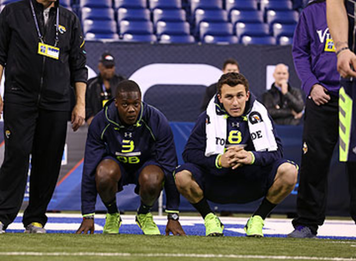 Teddy Bridgewater (left) and Johnny Manziel sat out the passing drills at the combine. (Todd Rosenberg/SI/The MMQB)