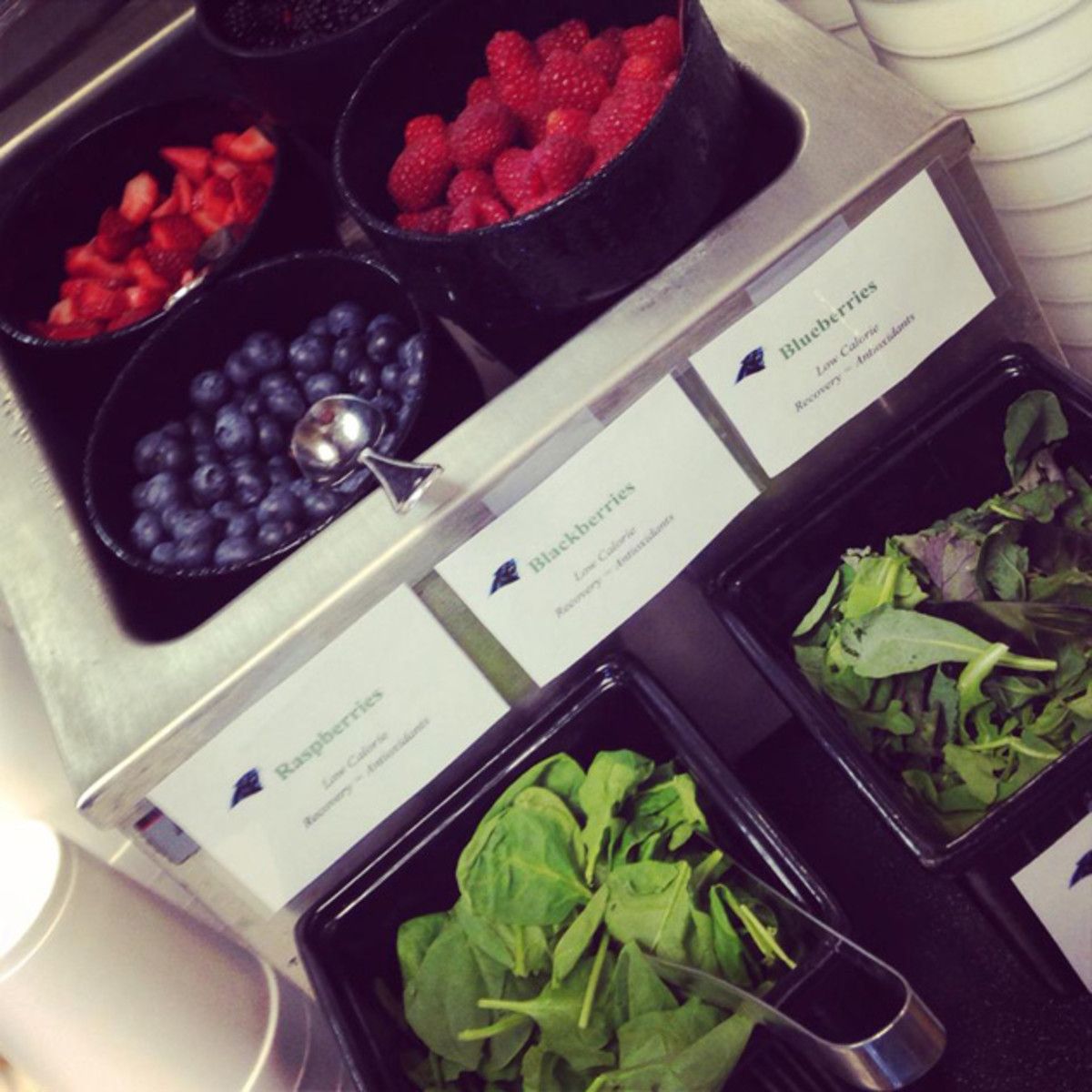 The Panthers' smoothie station has a variety of fruits, greens, milks, yogurts and protein powders, and labels to help the players understand what each food provides for their bodies. 