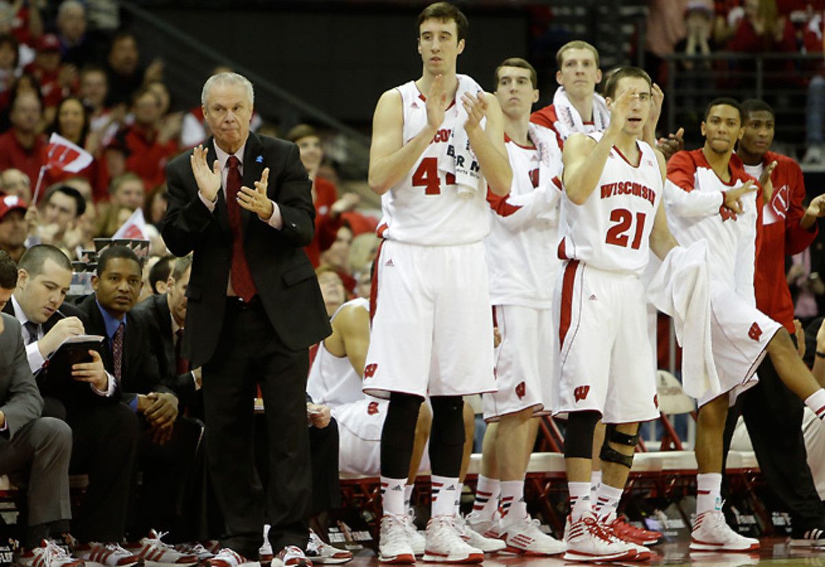Bo Ryan (red tie, standing) coached for 15 years before getting his first Division I job.