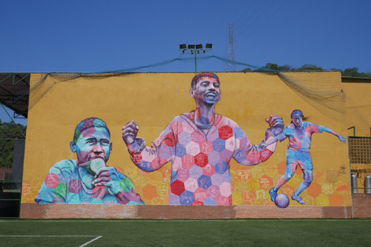 A mural hangs at the Street Child World Cup, a tournament featuring underprivileged children from around the world and is aimed at raising awareness for child homelessness.