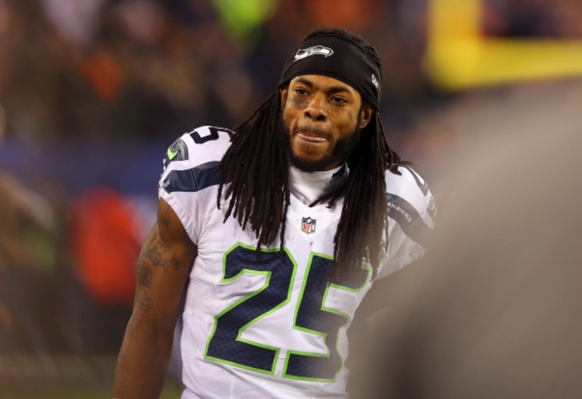 Richard Sherman will become the highest paid corner in the league. (Elsa/Getty Images)