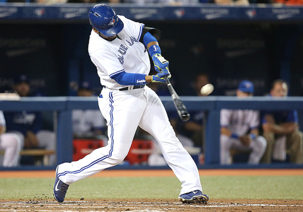 A red-hot Edwin Encarnacion hit two home runs against the Royals. (Tom Szczerbowski/Getty Images)