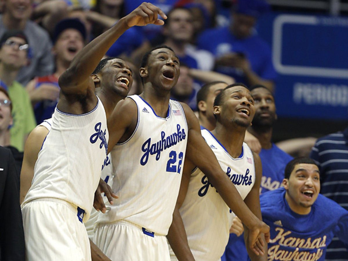 There was plenty to celebrate for Andrew Wiggins (22) and Kansas during its rout of Texas. (Ed Zurga/Getty Images)