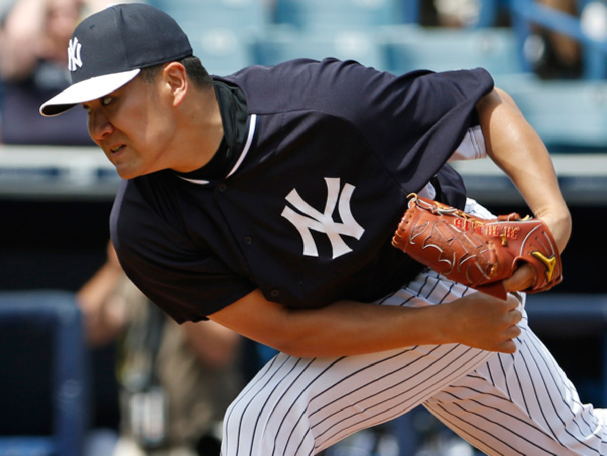 Masahiro Tanaka was just one of the Yankees' many offseason additions. (Kathy Willens/AP)