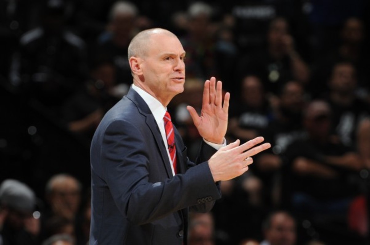 Rick Carlisle and Gregg Popovich are matched up in the first round of the NBA playoffs. (Garrett Ellwood/Getty Images)
