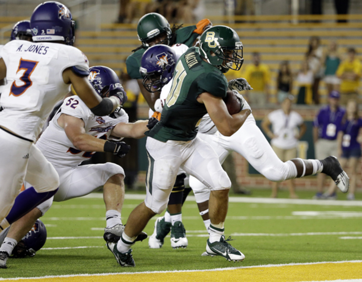 Nacita (31) fights his way into the end zone for a score late in the second half of a Baylor-Northwestern State game in September.