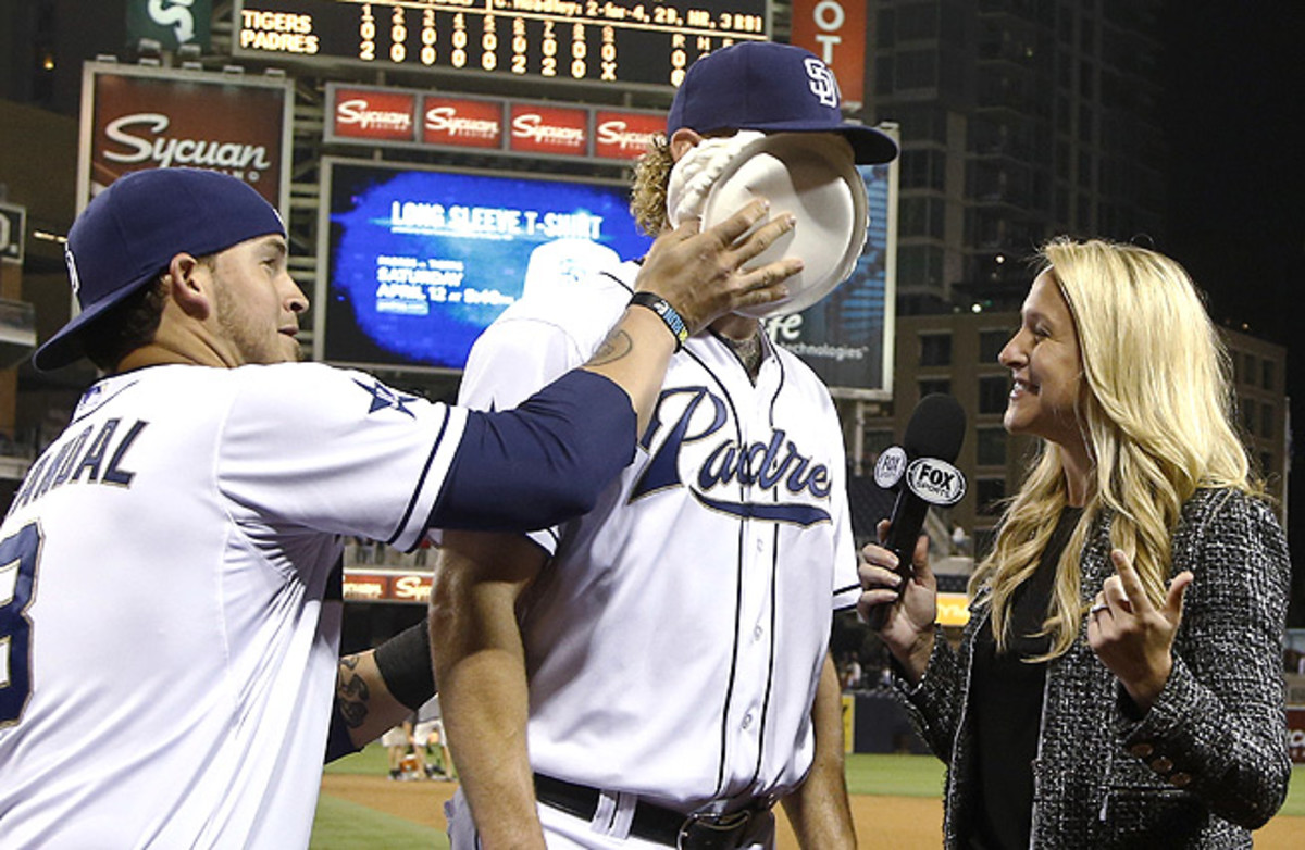 Andrew Cashner gets a shaving-cream pie to the face after pitching a one-hit shutout against the Tigers.