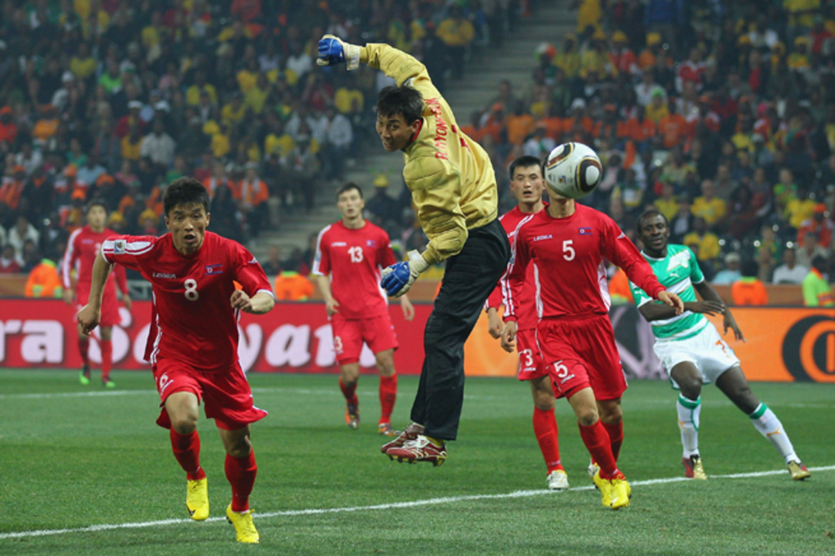 North Korea players chase down the ball while playing against Ivory Coast in the 2010 World Cup in South Africa.