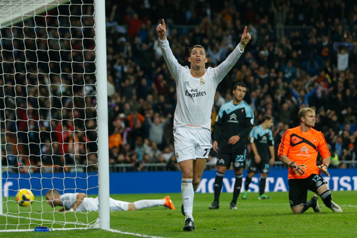 Cristiano Ronaldo celebrates after scoring one of his two goals in Real Madrid's 3-0 win over Celta Vigo on Monday.