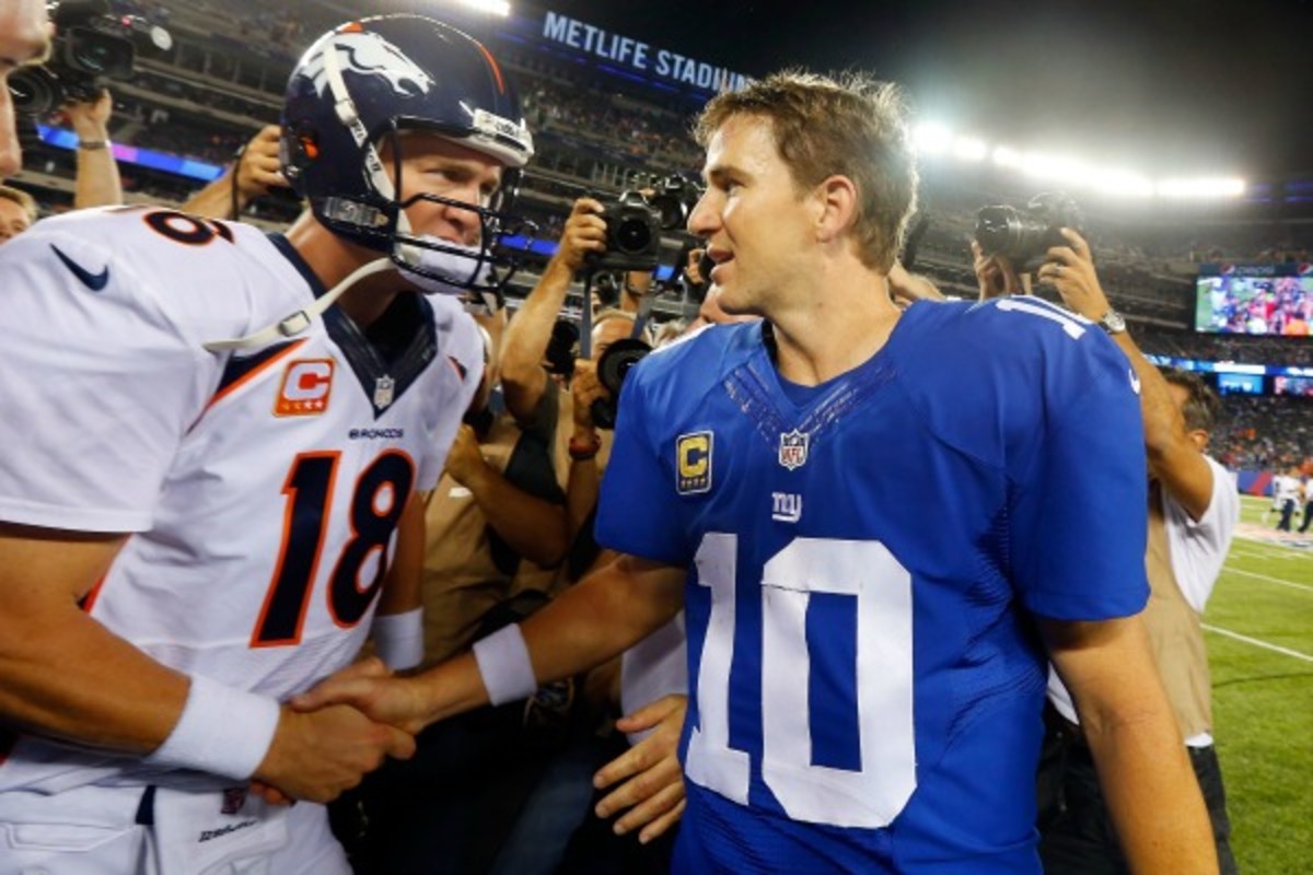 Peyton and Eli (Jim McIsaac/Getty Images)