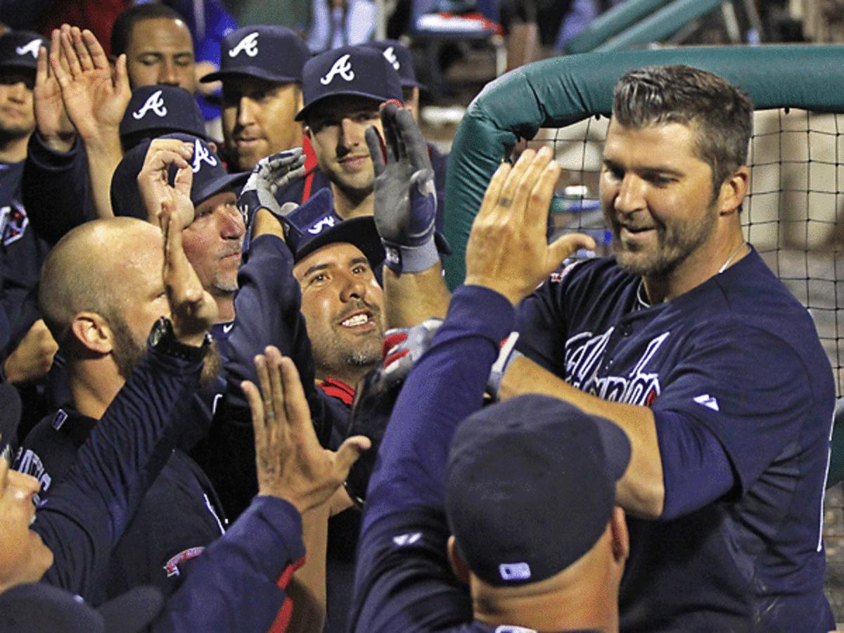 The oft-criticized Dan Uggla had a game to remember with two homers and a game-winning grand slam. (H. Rumph Jr./AP)