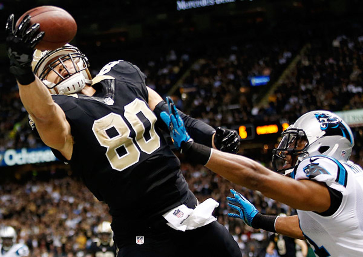 Jimmy Graham (left) is due for a raise, but the Saints are in a deep cap hole. 