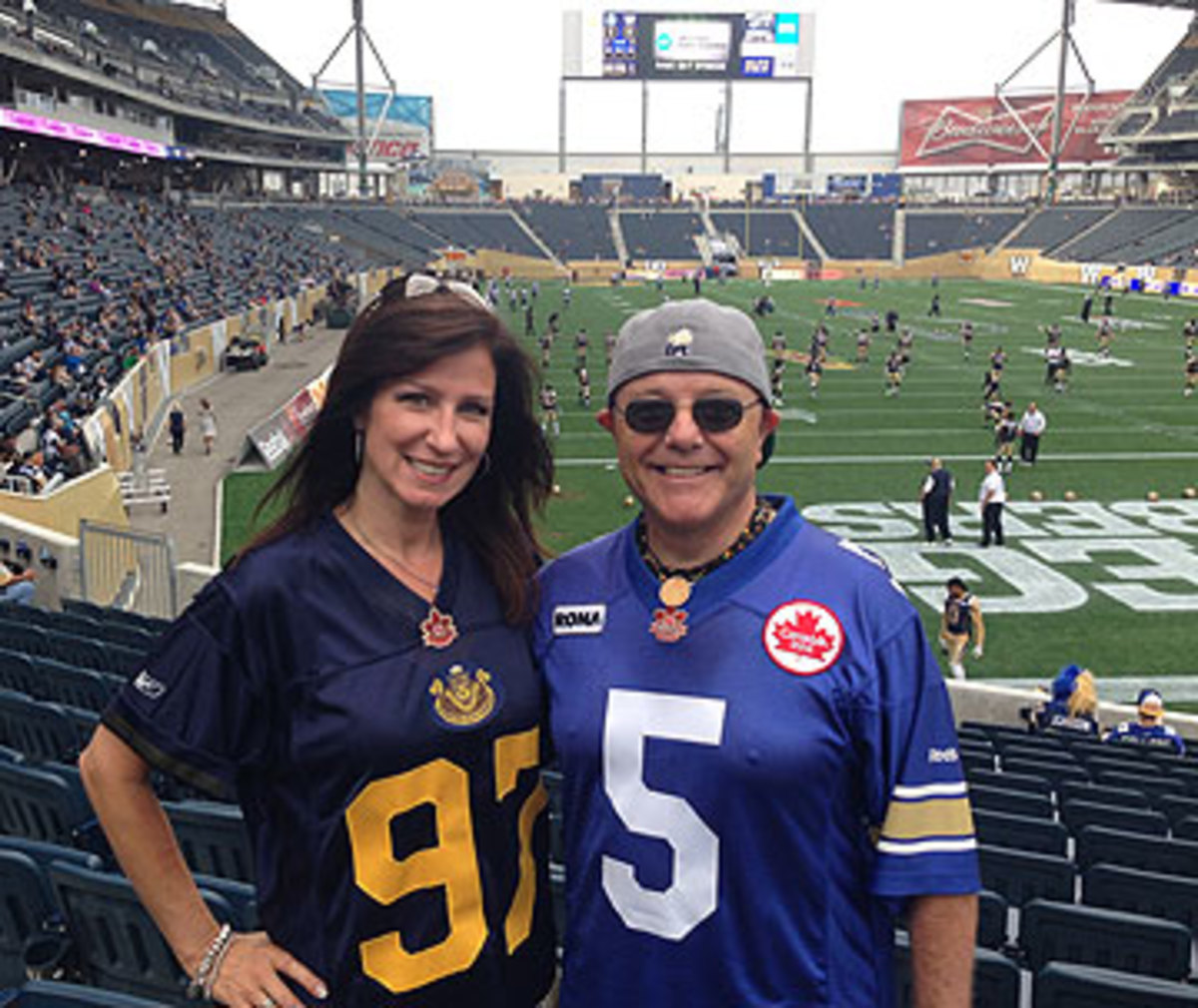 Becky Kaufmann and Chuck Duboff have had Bombers tickets in their families for more than 50 years each. (Photo by Jenny Vrentas)