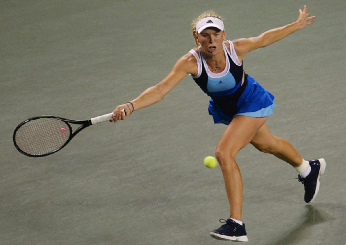 Caroline Wozniacki tweaked her shoulder before leaving for Australia. (Atsushi Tomura/Getty Images)