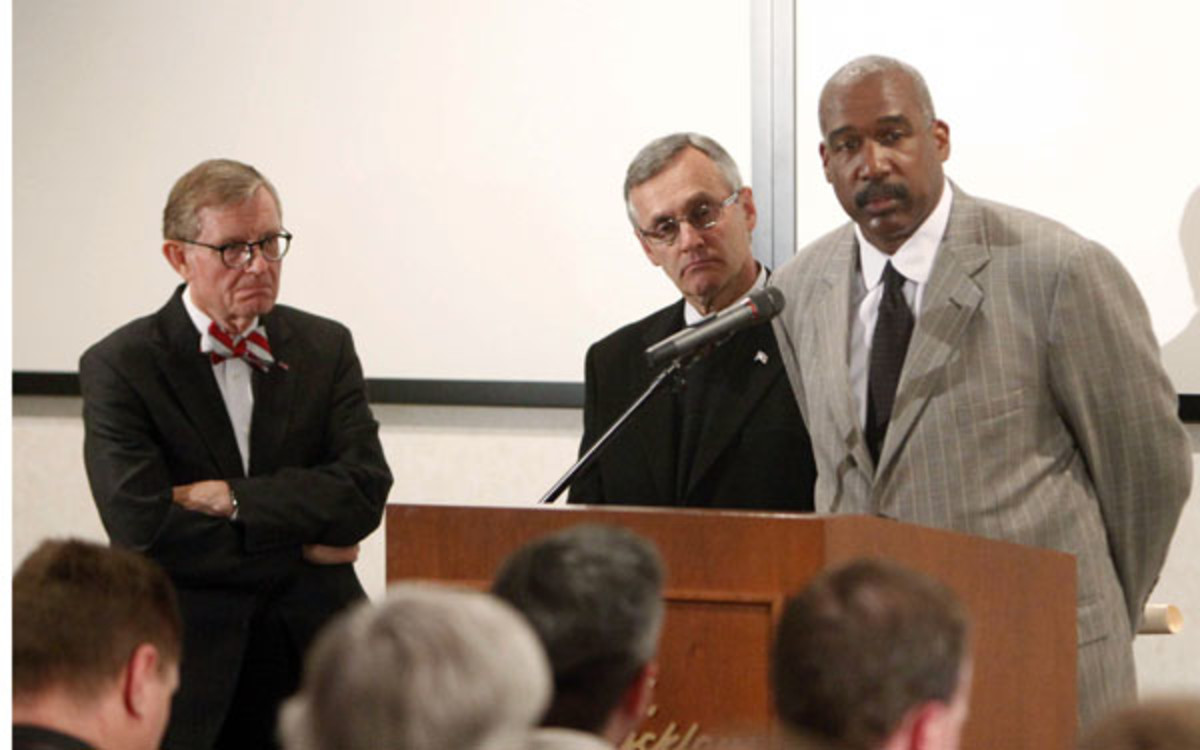 Former OSU staffers Jim Tressel, Gordon Gee and AD Gene Smith face questions about NCAA violations. (AP Photo/Terry Gilliam, 