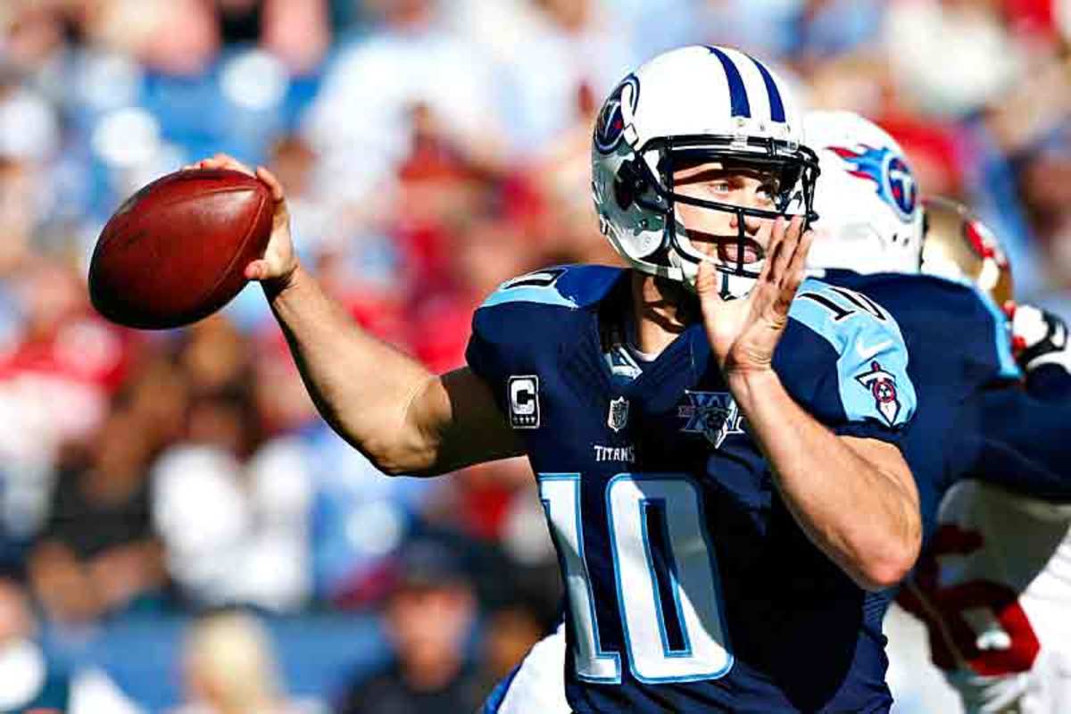 Whisenhunt’s task for 2014 is to evaluate whether Jake Locker is the future at QB. (Wesley Hitt/Getty Images)