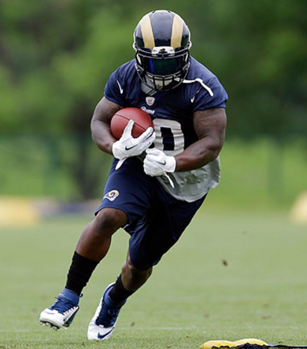 Zac Stacy was a pleasant surprise as a rookie but he'll have to fight for carries in 2014. (Jeff Roberson/AP)
