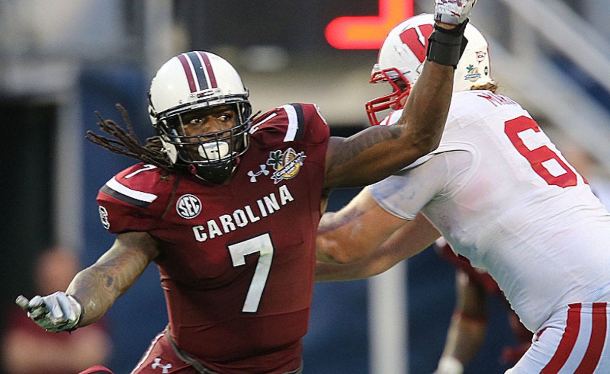 Jadeveon Clowney averaged 10.5 sacks and 17.5 tackles for loss in his first two seasons at South Carolina. In 2013, he had three sacks and 11.5 TFL. (Alex Menendez/AP)