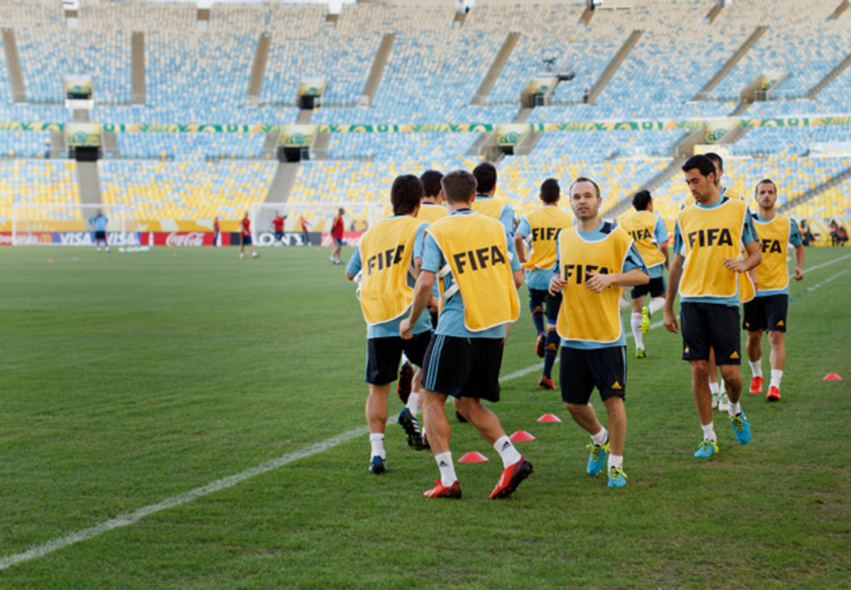 Players from Spain's national team exercise during a training session ahead of the FIFA Confederations Cup Brazil at the Estadio do Maracana, where the Bermuda Celebration grass has been installed in advance of the 2014 World Cup.