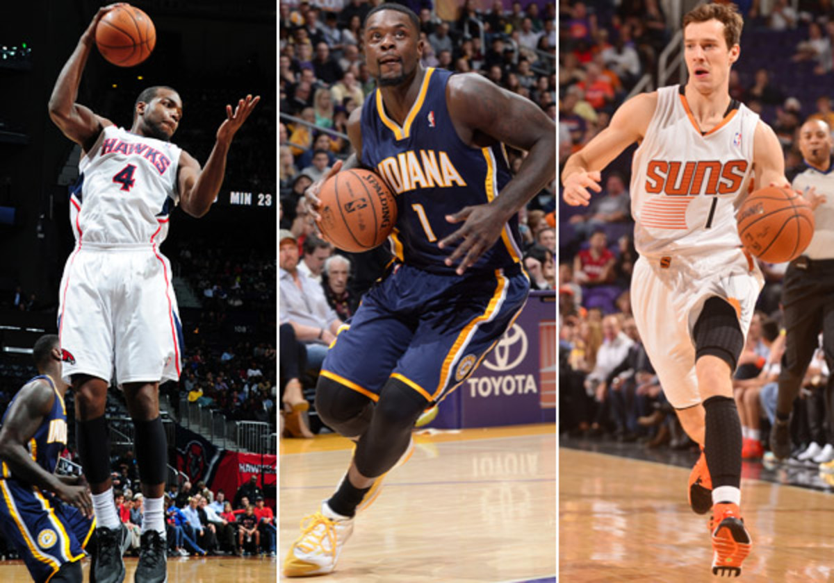 Paul Millsap, Lance Stephenson and Goran Dragic