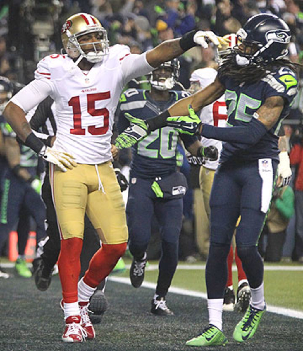 Crabtree and Sherman reportedly have a history, which carried over onto the field Sunday. (Tony Overman/Getty Images)