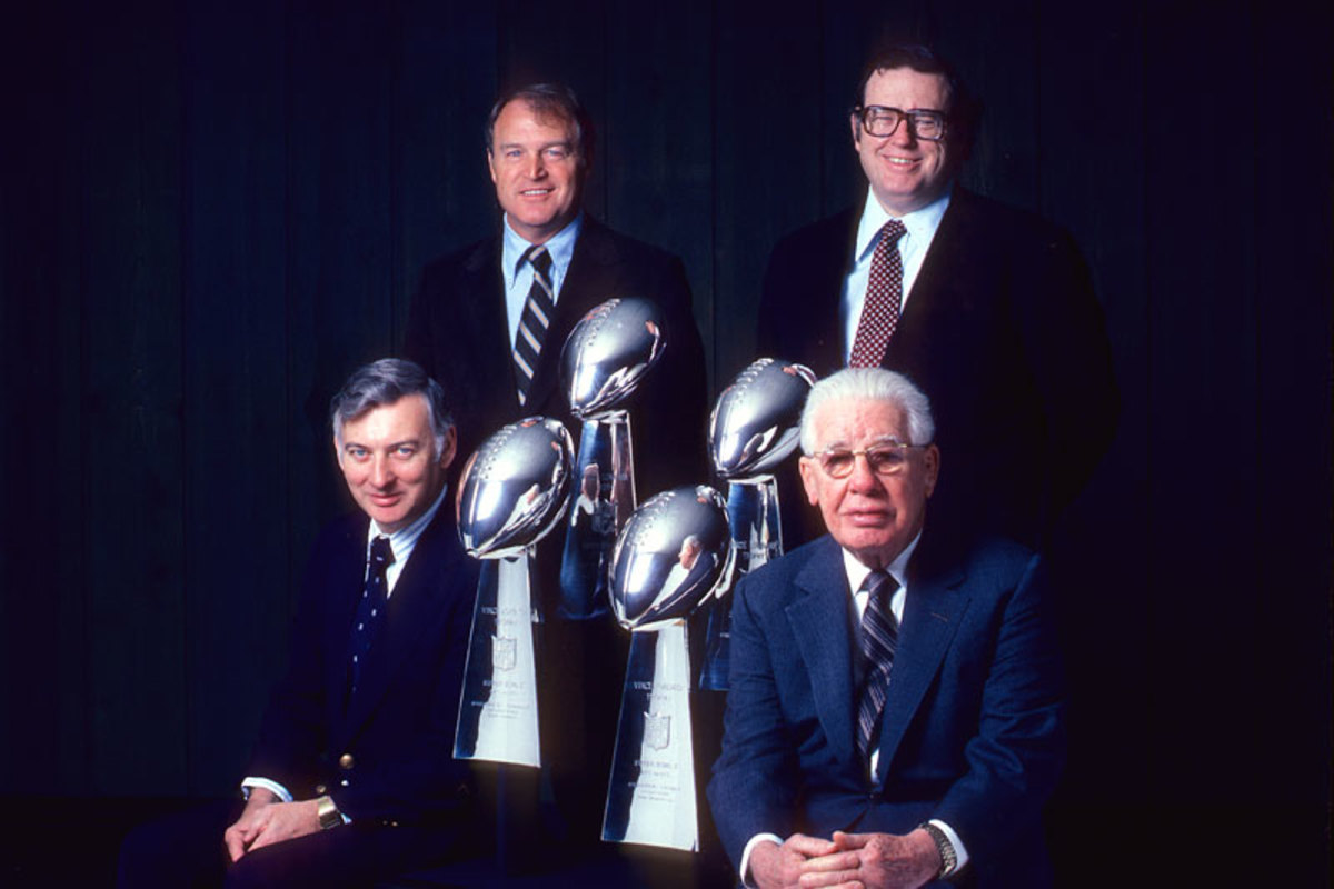 A 1982 portrait of Steelers front office (l. to r.) team president Dan Rooney, coach Chuck Noll, team vice president Art Rooney Jr., and owner and chairman Art Rooney Sr. (John G. Zimmerman/SI)