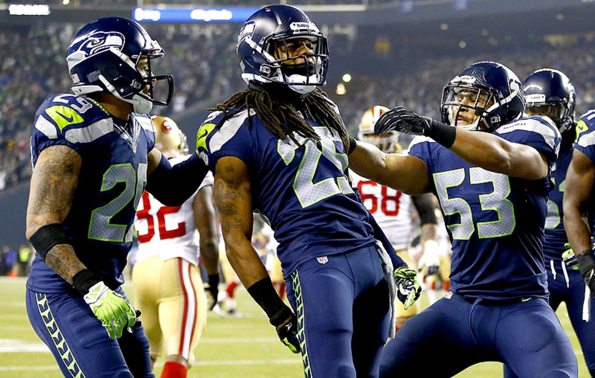 The Seahawks embrace Sherman and all that comes with him, though the cornerback did end up apologizing for taking attention away from his teammates following Sunday's win.  (Tony Overman/Getty Images)