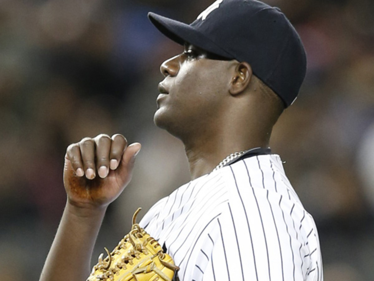 Pine tar or some other substance was clearly visible on Michael Pineda's pitching hand Thursday. (Kathy Willens/AP)