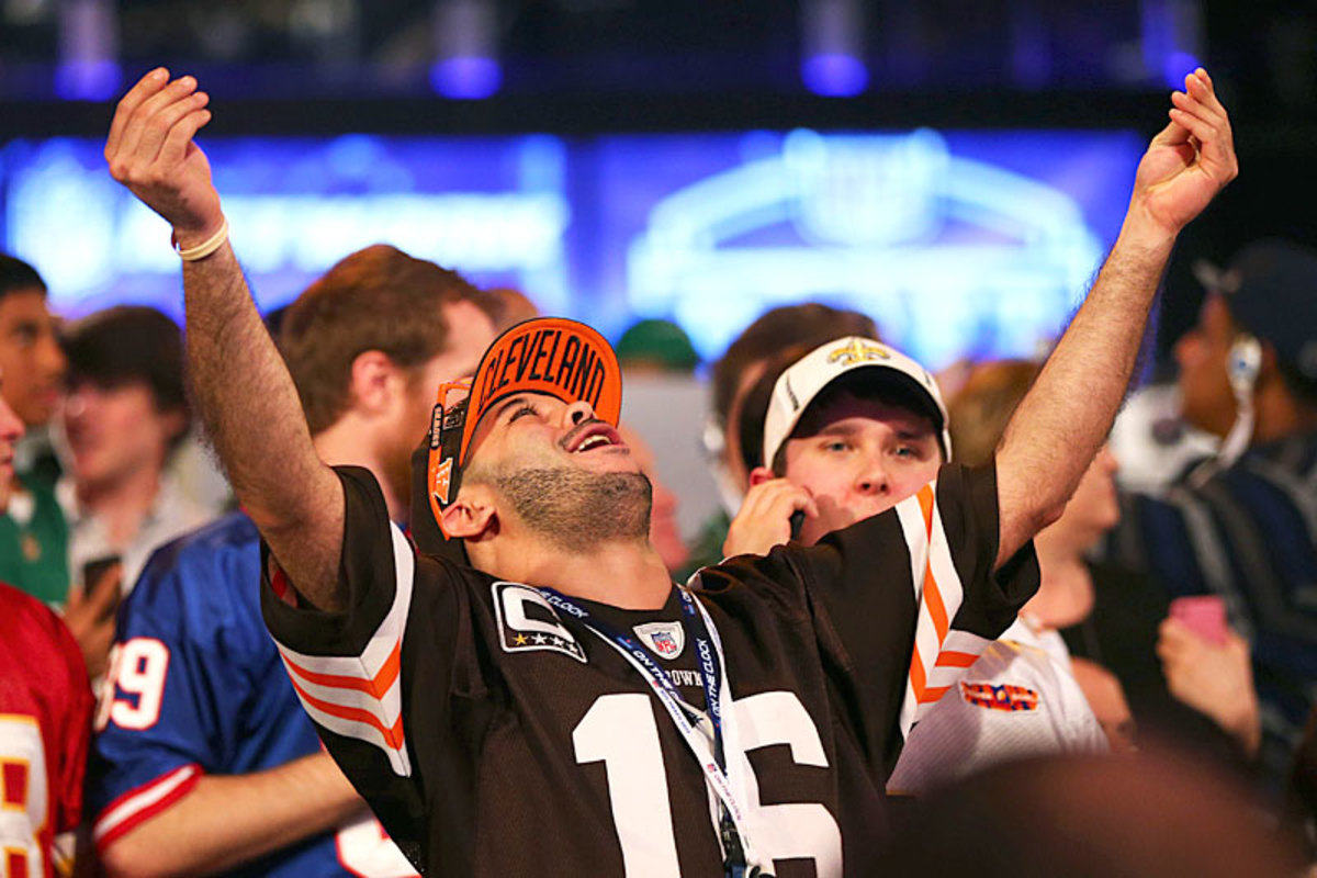 Cleveland fans hail the perceived savior. (Elsa/Getty Images)