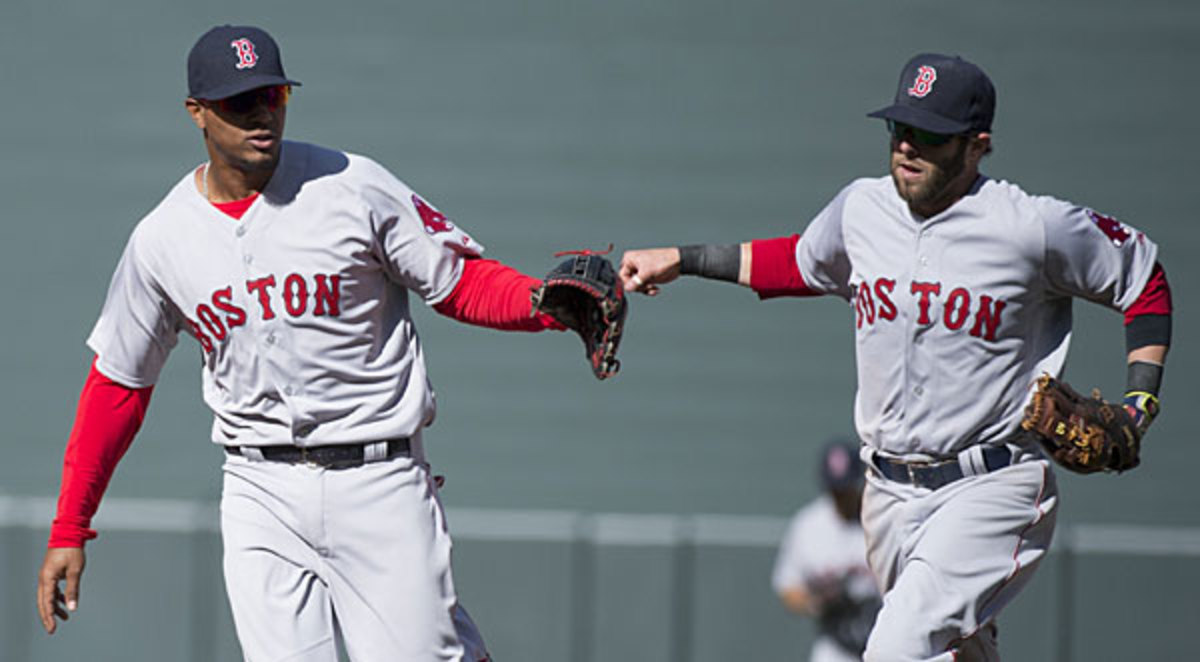 The Red Sox are hoping to have the same success moving Xander Bogaerts (left) to another position as they had with Dustin Pedroia.