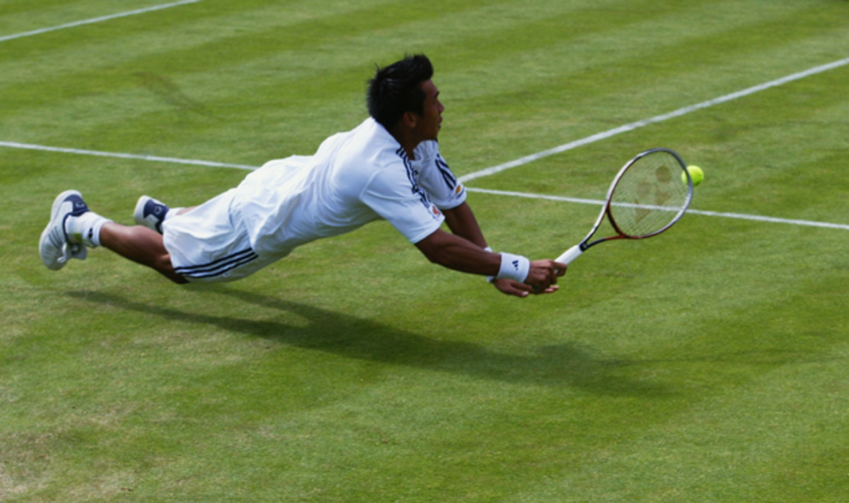 Srichaphan dives for a backhand during Wimbledon in 2003.