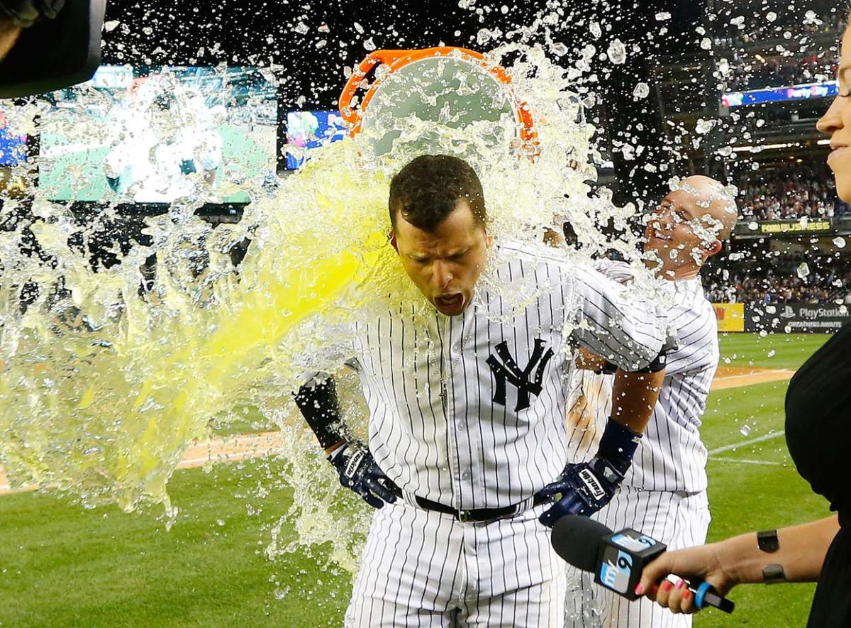 0822-Martin-Prado-doused-by-Brett-Gardner.jpg