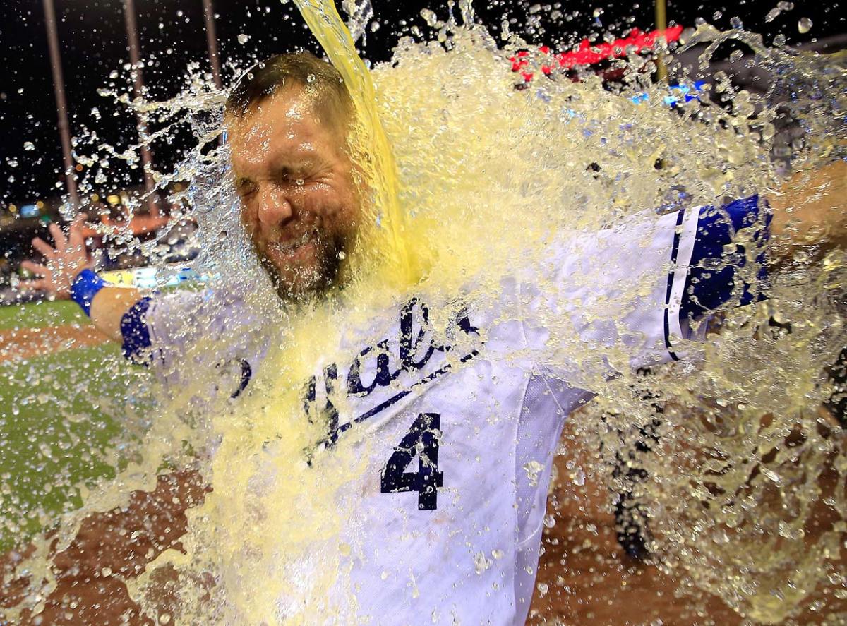 0826-Alex-Gordon-doused-by-Salvador-Perez.jpg