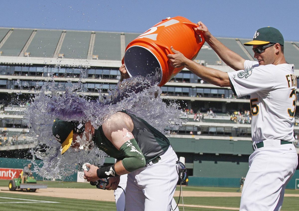 0906-Jed-Lowrie-doused-by-Nate-Freiman.jpg