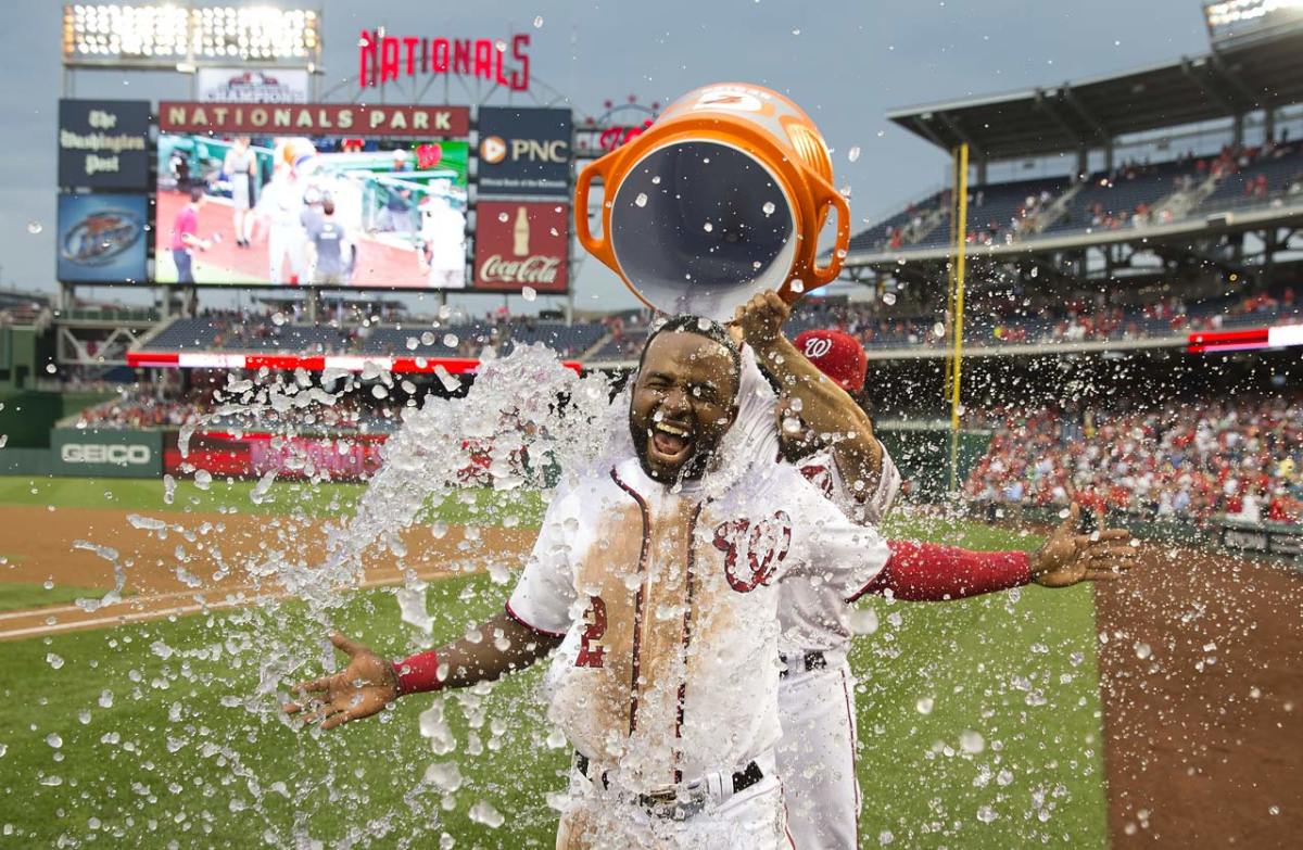 0821-Denard-Span-doused-by-Anthony-Rendon.jpg