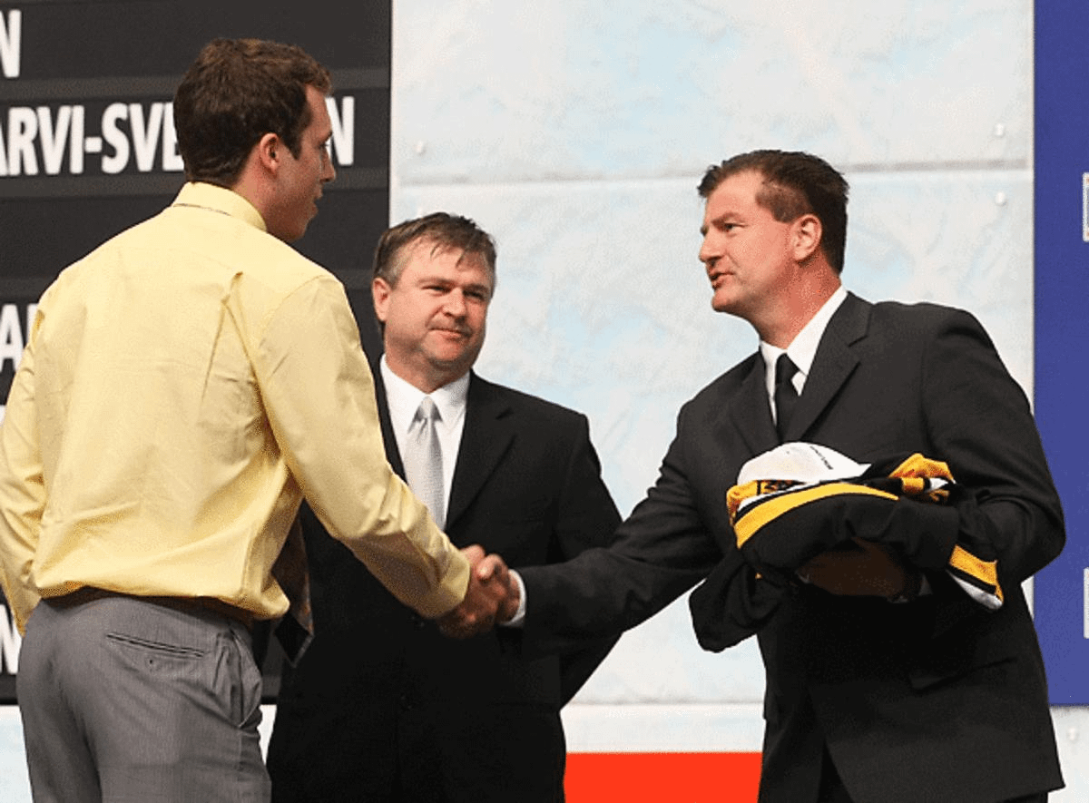 Jim Benning, seen here in 2009, moves from Boston to assume Vancouver's GM role. (Bruce Bennett/Getty Images)