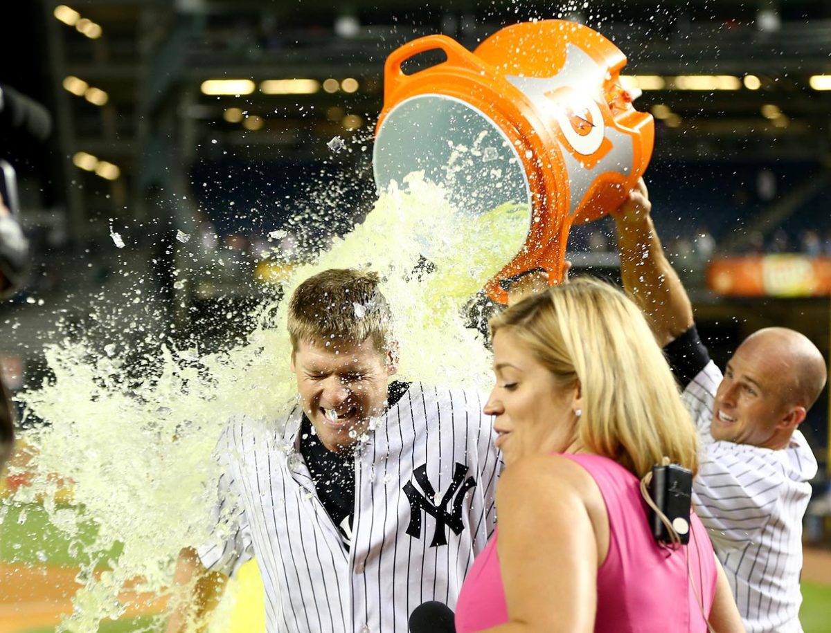 0722-Chase-Headley-doused-by-Brett-Gardner.jpg