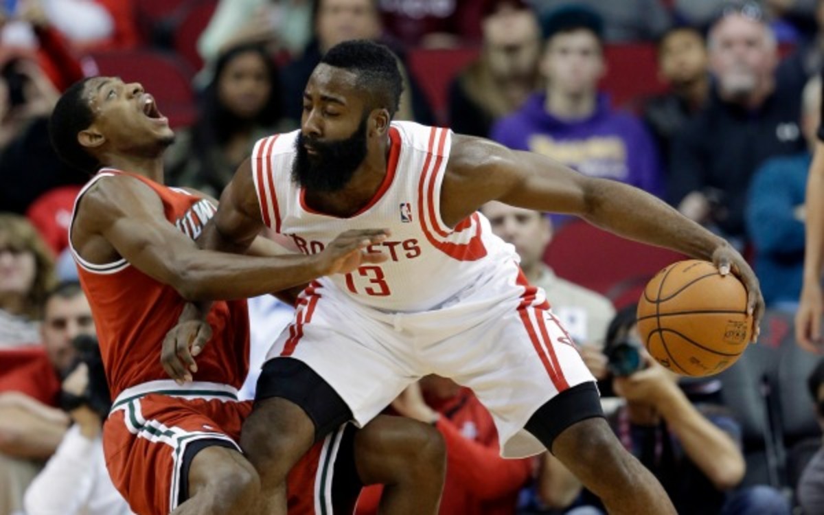 Bucks guard Brandon Knight is called for a foul for this flop against the Rockets. (AP Photo/David J. Phillip) 