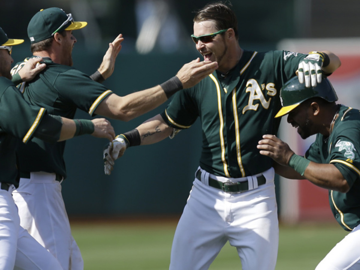 Josh Reddick (center) and the A's have won eight of their last 10, including a weekend sweep of the Astros.