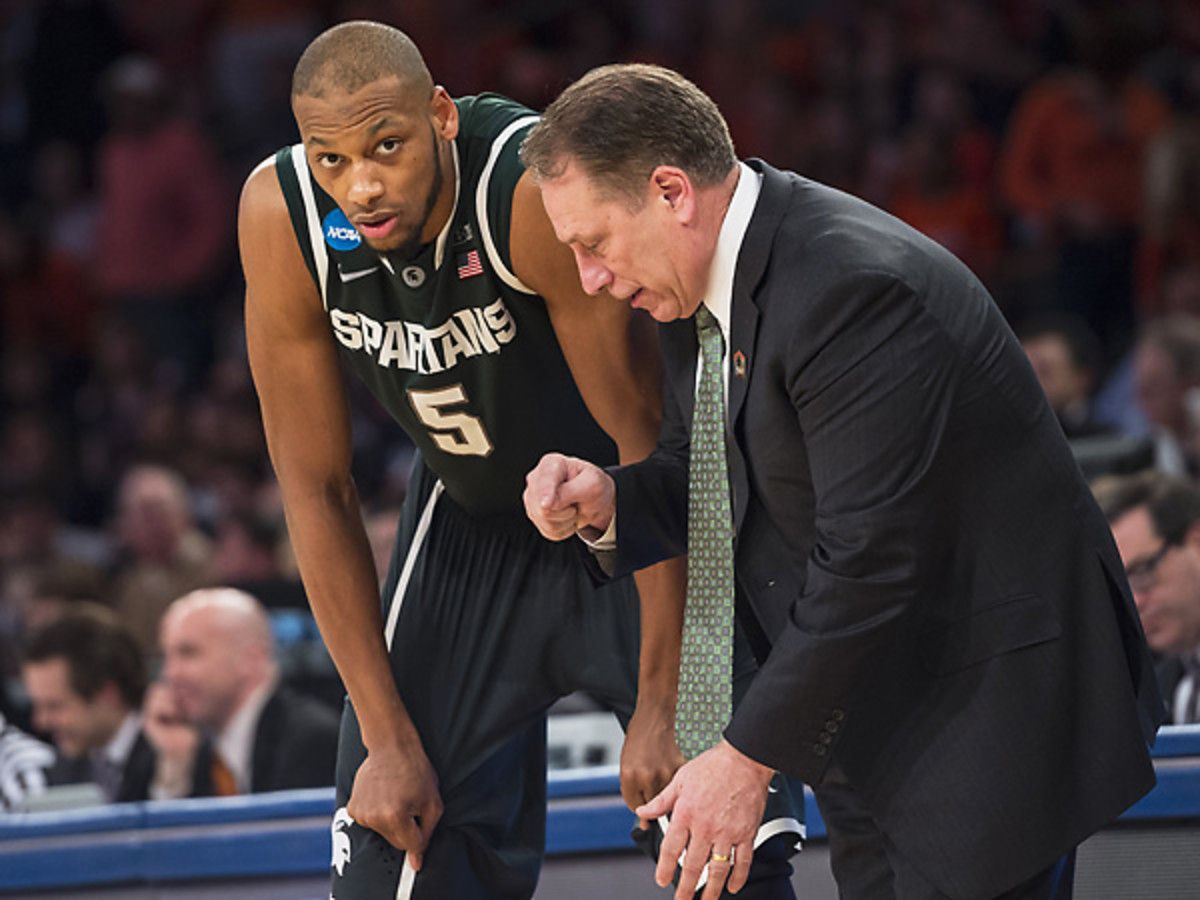 Adreian Payne and Tom Izzo face an unlikely Elite Eight opponent in UConn. (Heinz Kluetmeier/SI)