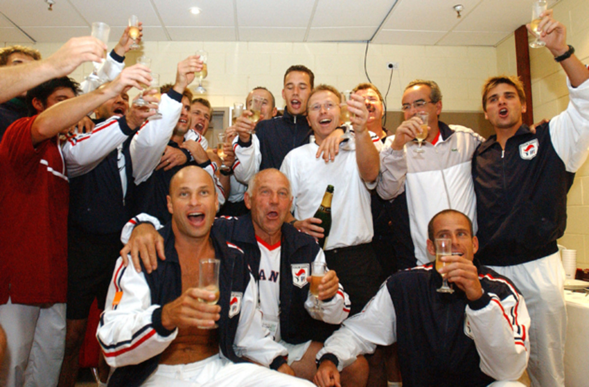 The victorious French Davis Cup team celebrates their win.