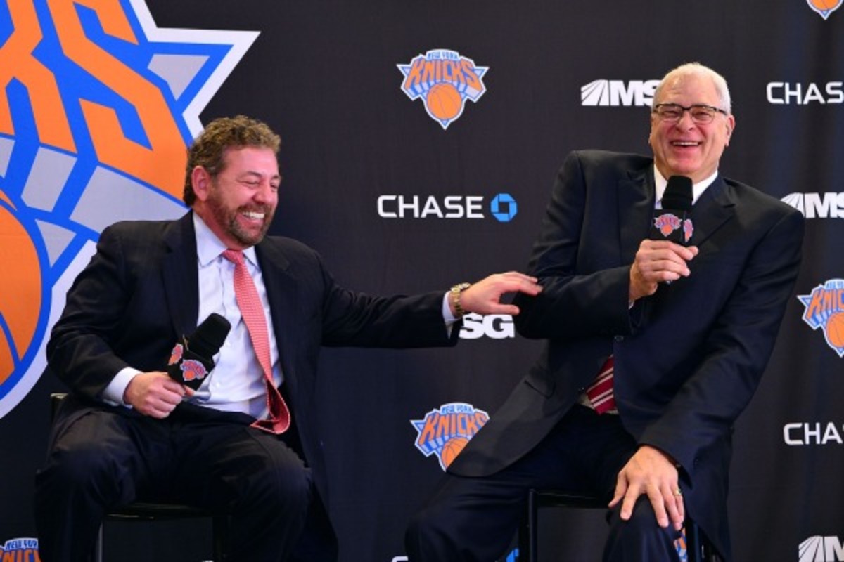 Might there already be trouble in paradise between James Dolan (left) and Phil Jackson? (James Devaney/Getty Images)
