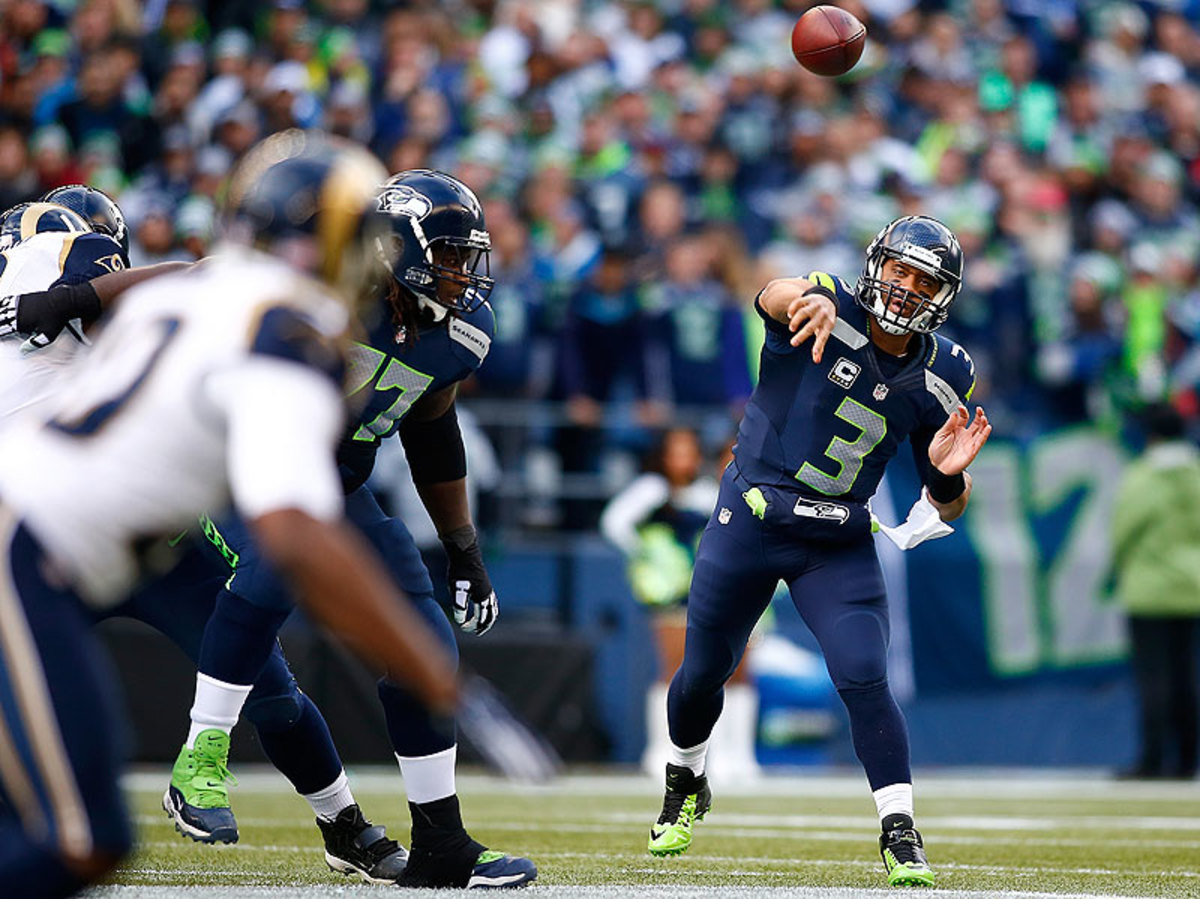 For the second straight season, Russell Wilson and the Seahawks enter the postseason as the NFC's No. 1 seed. (Jonathan Ferrey/Getty Images)