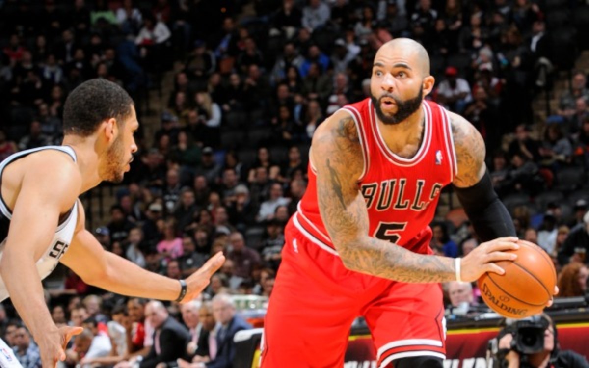 Bulls forward Carlos Boozer's 14.8 ppg average is the lowest since his rookie year. (D. Clarke Evans/NBAE via Getty Images)