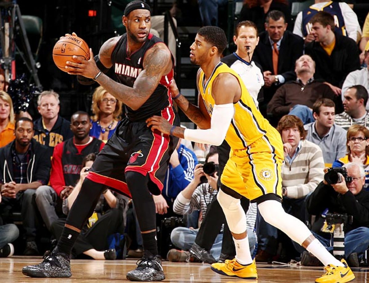 LeBron James (left) and Paul George will square off in the East finals for the second year in a row.
